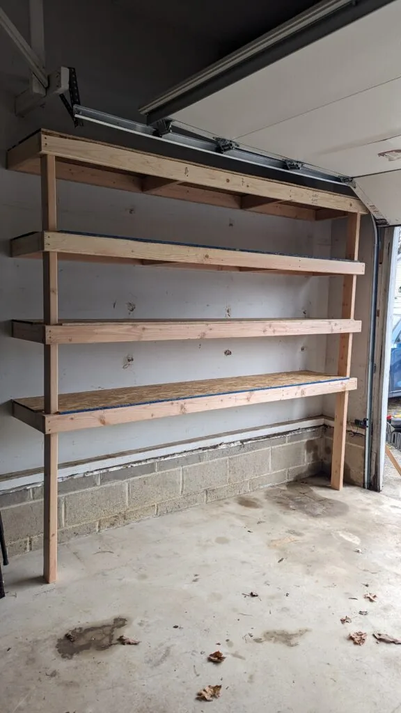 After: Shelves before and after installation. Level and anchored, photographed when done.