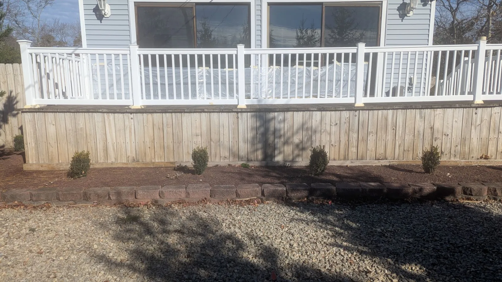 Before: Deck skirting in Brick, NJ: power washed, then stained.