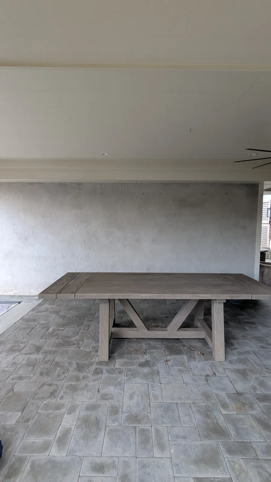 The plain patio wall in Mantoloking, NJ, before the new panel wall went up