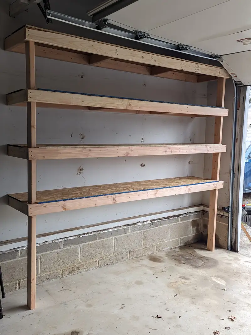 A wooden shelving unit we built and installed on a garage wall in Toms River, NJ