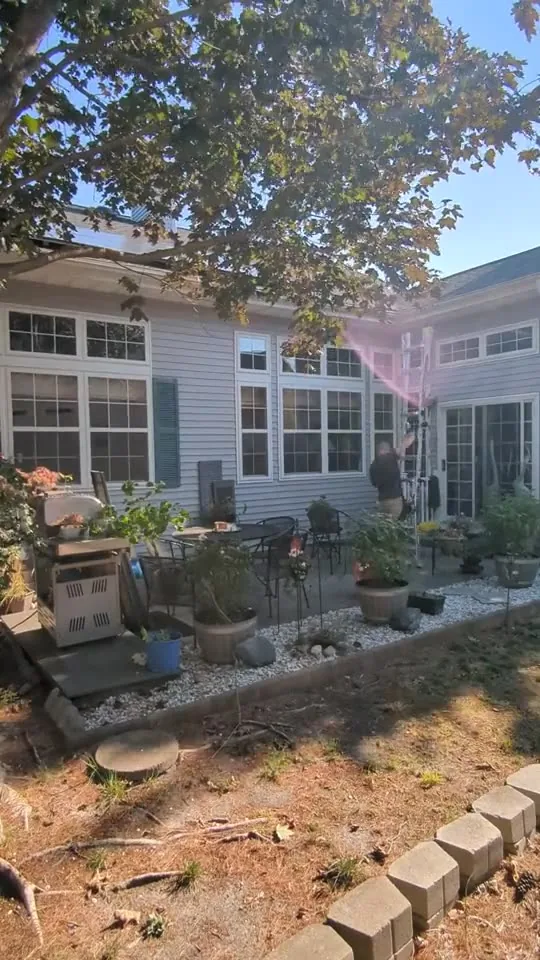 The back windows of a home being washed in Barnegat